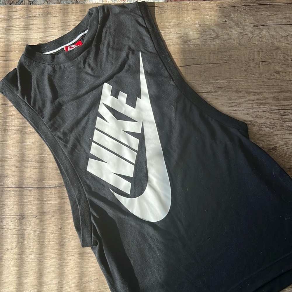 Nike size xs women’s muscle tank. Black and white. Like new.